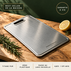 Forneau titanium cutting board on olive wood with rosemary and lemon