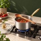 Tomato sauce simmering in the Forneau titanium saucepan on a gas hob